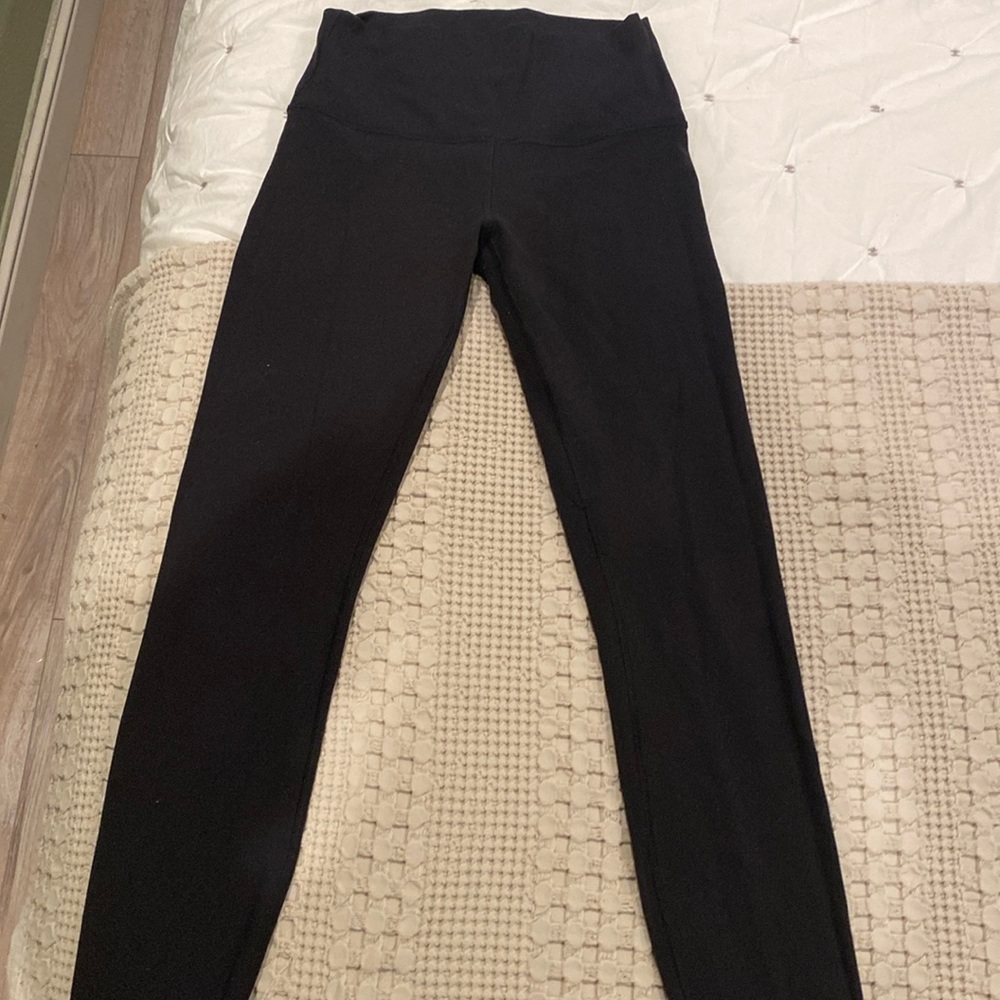 Worn lulu lemon leggings in size two and color black